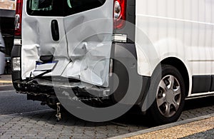 White van damaged in a rear-end collision