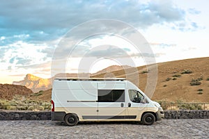 White Van Parked Alongside Road