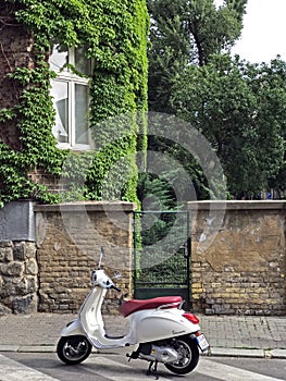 White vespa scooter in Bratislava, Slovakia