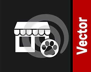 White Veterinary medicine hospital, clinic or pet shop for animals icon isolated on black background. Vet or