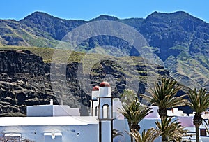 White village below high peaks, Canary Islands photo