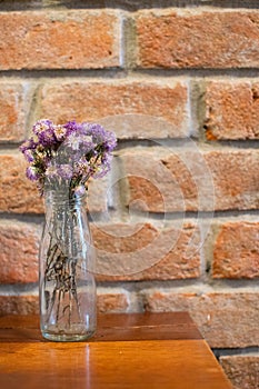 White vintage bottle with dried flower