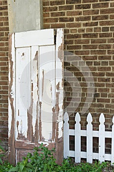 White vintage door fence brick wall