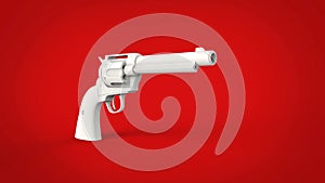 White vintage revolver gun on a red background