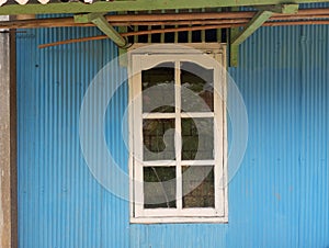 white vintage style wooden windows that have begun to age over time