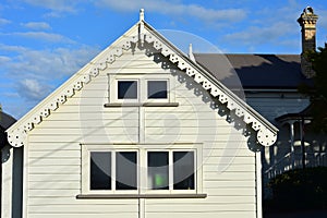 White vintage wooden studio facade