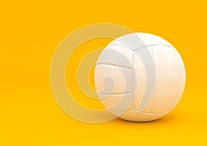 White volleyball isolated on a yellow background