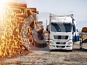 White wagon and forklift and stacks of new wooden planks and studs in a lumber warehouse. Wooden slabs on piles for furniture