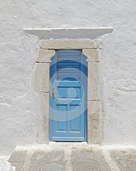 White wall and blue door, Mikonos island photo
