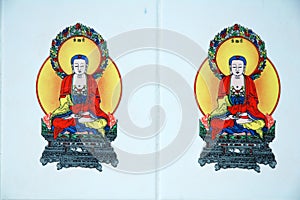 White wall with buddha