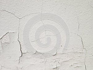 White wall with cracks