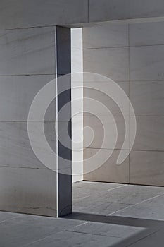 White wall with light and shadow contrast.