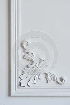 White wall molding with geometric shape and vanishing point. Luxury white wall design bas-relief with stucco mouldings