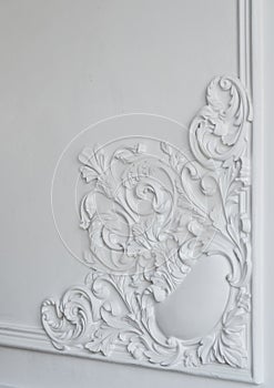 White wall molding with geometric shape and vanishing point. Luxury white wall design bas-relief with stucco mouldings