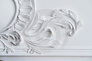 White wall molding with geometric shape and vanishing point. Luxury white wall design bas-relief with stucco mouldings