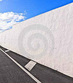 White wall with part of street