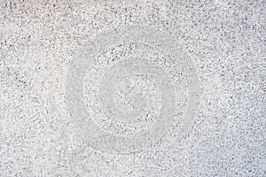 White wall in speckles background, texture