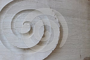 White wall texture background with stucco helix and space for text