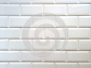 White wall tiles. White wall tunnel. Kitchen stove. White ceramic. White ceramic background.