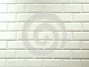 White wall tiles. White wall tunnel. Kitchen stove. White ceramic. White ceramic background.