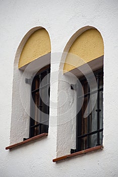 Two twin windows with yellow bow