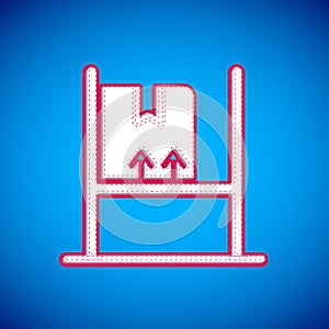 White Warehouse interior with boxes on racks icon isolated on blue background. Logistics, cargo, parcel storage postal