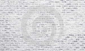 White washed brick wall texture. Light grey rough brickwork. Whitewashed vintage background photo