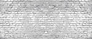 White washed old shabby brick wall wide texture. Large light grey rustic brickwork. Whitewashed widescreen vintage background