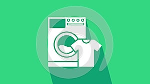 White Washer and t-shirt icon isolated on green background. Washing machine icon. Clothes washer, laundry machine. Home