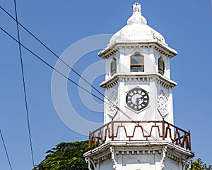 The white watch tower with clock Muthialpet Manikoondu in Puducherry Pondicherry, Tamil Nadu