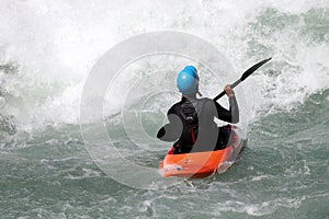 White water kayaking on the rapids of river