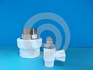 White water pipe fittings polypropylene valve on blue background
