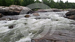 White water rushing at Pabineau Falls, New Brunswick, Canada