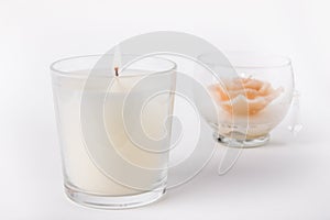 White Wax Candle in glass on white background, product mock-u