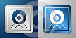 White Web camera icon isolated on blue and grey background. Chat camera. Webcam icon. Silver and blue square button