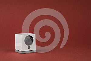 White webcam on red background, object, Internet, technology concept