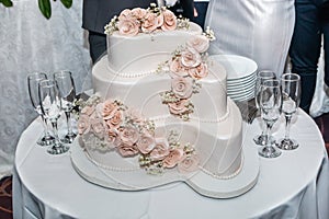 White wedding cake on restaurant table