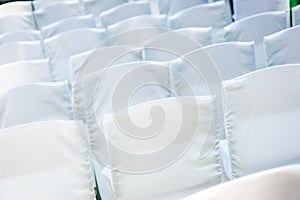 White wedding chairs for the ceremony