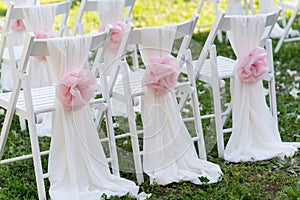 White wedding chairs for the ceremony