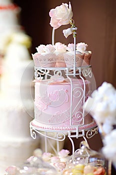 White wedding cupcake cake decorated with flowers