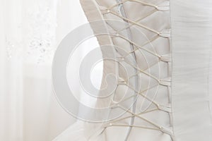 White wedding dress with lacing on the back