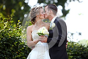 White wedding kiss young couple