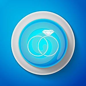 White Wedding rings icon isolated on blue background. Bride and groom jewelery sign. Marriage icon. Diamond ring icon