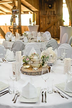 White wedding table with flowers
