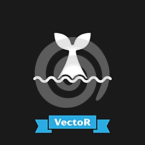 White Whale tail in ocean wave icon isolated on black background. Vector