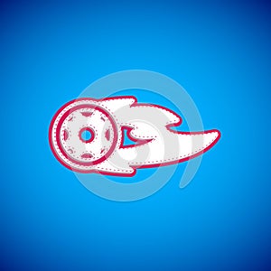 White Wheel in fire flame icon isolated on blue background. Burning wheel. Vector