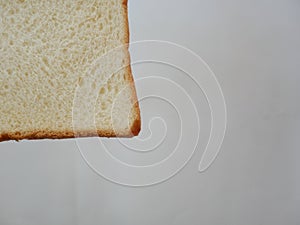 White whole wheat bread slice.