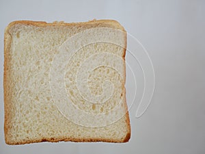 White whole wheat bread slice.