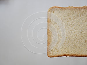 White whole wheat bread slice.