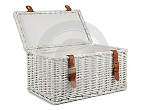 White wicker storage basket with leather handles isolated on white background